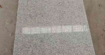 泸州芝麻白光面毛板