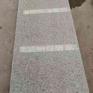 泸州芝麻白光面毛板